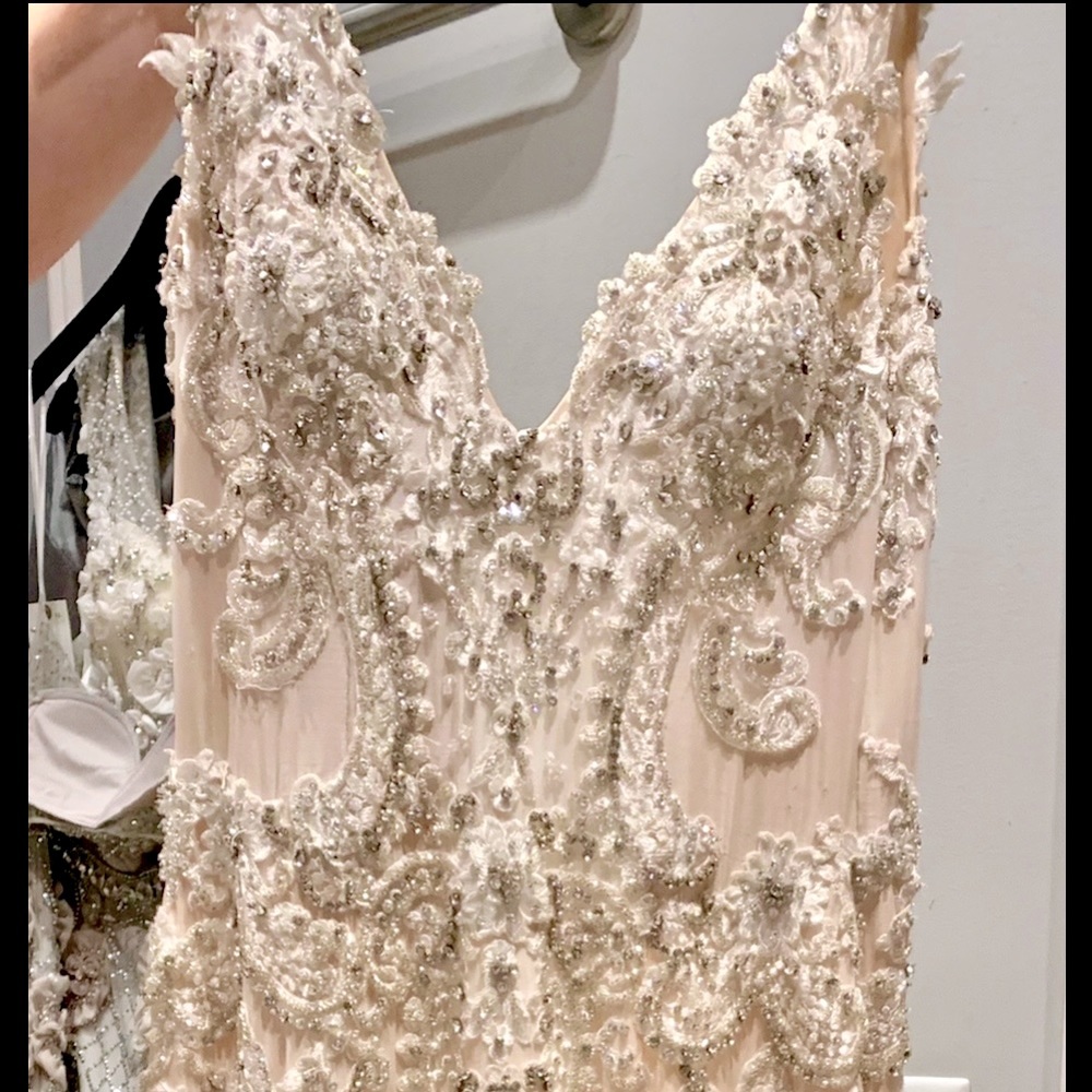 Never worn wedding gown plus matching veil